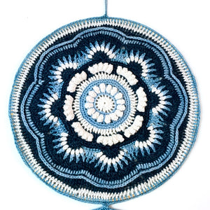 Closeup image of the Ravenna Mandala Wall Art in Eco-Fusion Yarn by Nurturing Fibres