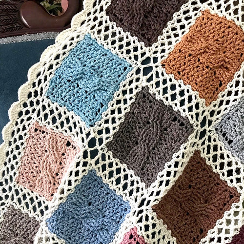 BonnieBay's Bonbon Blanket on chair closeup