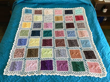 Load image into Gallery viewer, BonnieBay&#39;s Bonbon Blanket on bed, laid open 