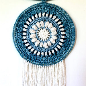 Closeup image of the Ravenna Mandala Wall Art in Eco-Fusion Yarn by Nurturing Fibres